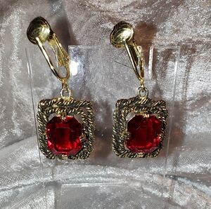 Vintage Sarah Coventry Gold Tone Clip-on Earrings With Bright Red Stones.